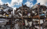 Waste electrical and electronic equipment collected in metal cages