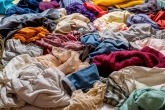 Textile waste pile garments