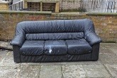 Waste sofa for collection