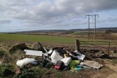 Waste illegally dumped on a piece of land