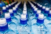 An image of plastic bottles of water