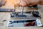 Apple iPhone being repaired