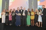 Winners at the Drapers Sustainable Fashion Awards hold up their Awards